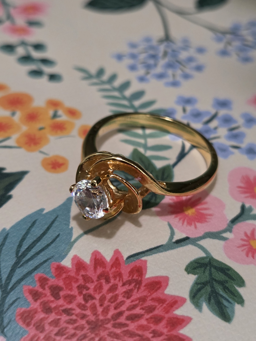 Gold Solitaire Floral Accent Ring with Clear Stone